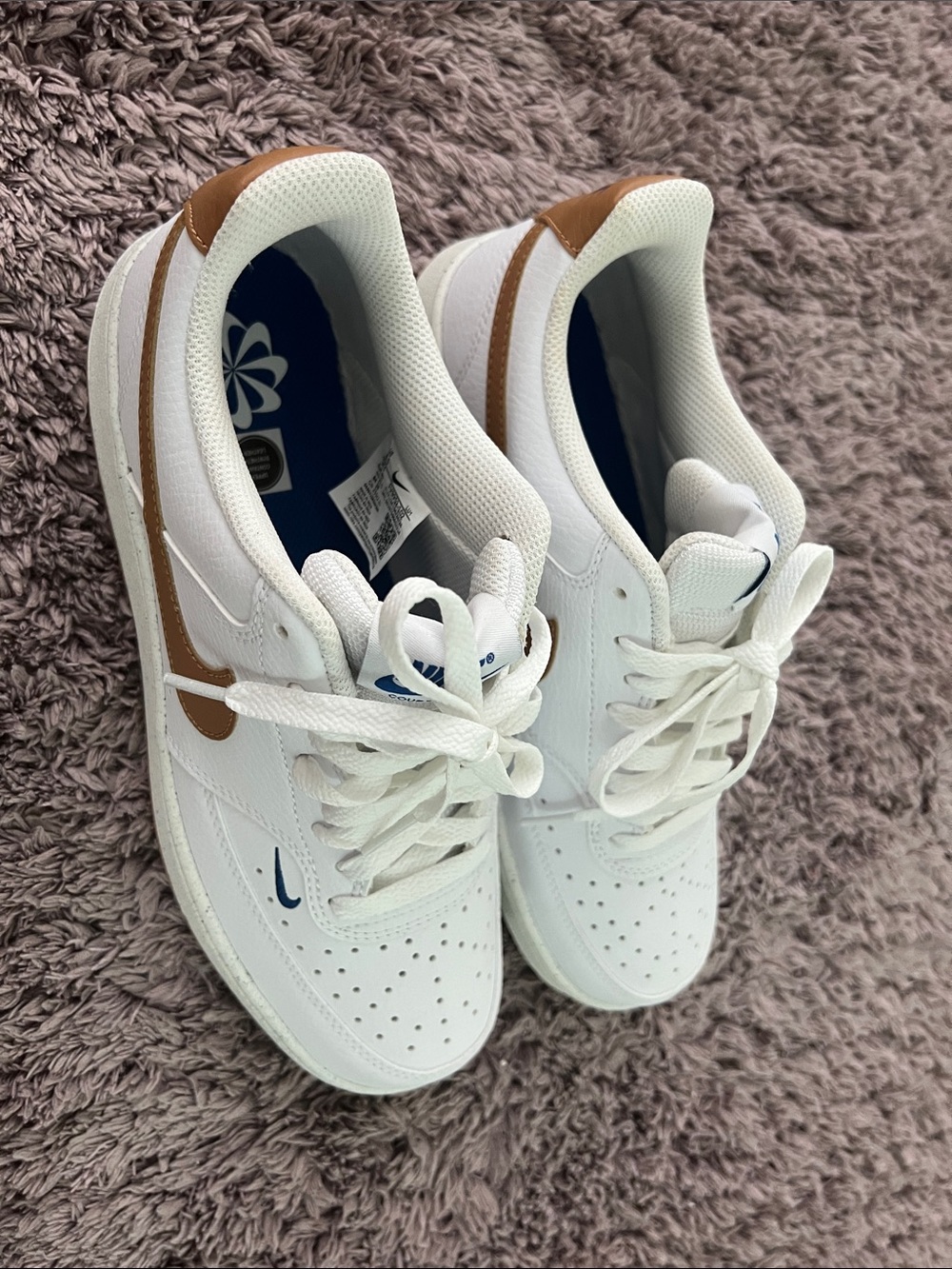 Nike Women’s White Sneakers with Brown Swoosh